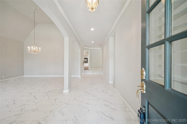3437 E 96th Pl, Tulsa, OK 74137 - entryway with arched walkways, light marble finish floors, a chandelier, recessed lighting, and crown molding