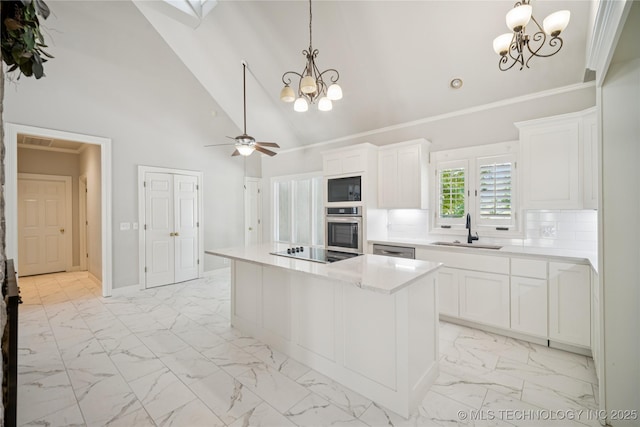 3437 E 96th Pl, Tulsa, OK 74137 - kitchen featuring a chandelier, stainless steel appliances, light marble finish flooring, light countertops, and high vaulted ceiling