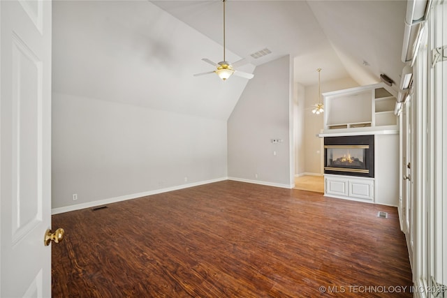 3437 E 96th Pl, Tulsa, OK 74137 - unfurnished living room with a ceiling fan, vaulted ceiling, wood finished floors, and a multi sided fireplace