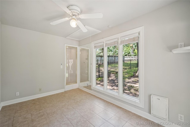 3437 E 96th Pl, Tulsa, OK 74137 - empty room with ceiling fan and light tile patterned floors