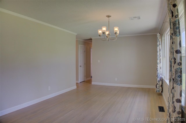 4424 E 59th Pl S, Tulsa, OK 74135 - empty room featuring light wood-type flooring, a chandelier, and crown molding