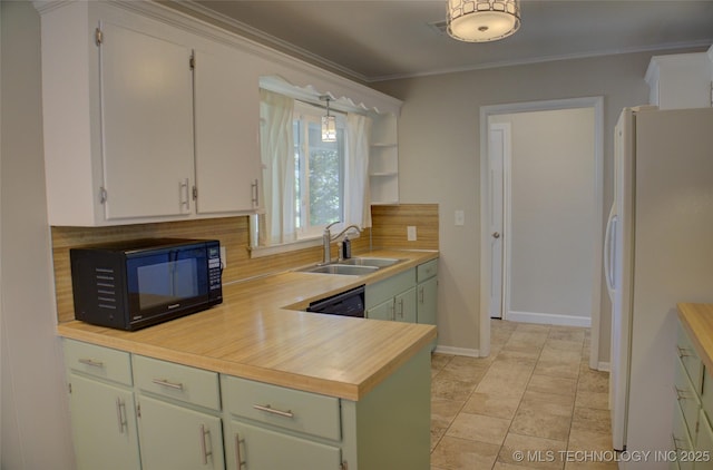 4424 E 59th Pl S, Tulsa, OK 74135 - kitchen featuring black microwave, freestanding refrigerator, backsplash, crown molding, and green cabinetry