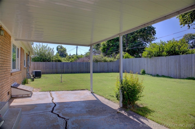 4424 E 59th Pl S, Tulsa, OK 74135 - fenced backyard with a patio area
