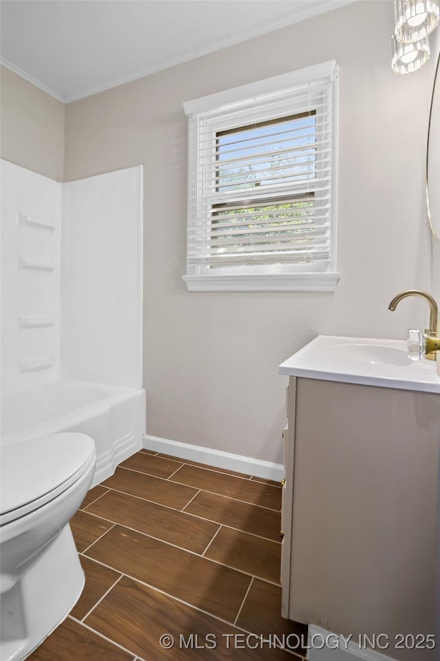 227 S Toledo Ave, Tulsa, OK 74112 - bathroom featuring vanity, wood tiled floors, ornamental molding, and tub / shower combination