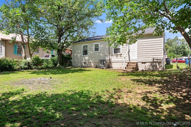 227 S Toledo Ave, Tulsa, OK 74112 - back of property with entry steps, a lawn, and crawl space