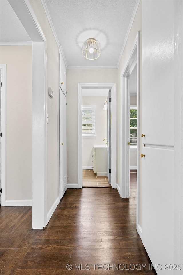 227 S Toledo Ave, Tulsa, OK 74112 - foyer entrance with dark wood finished floors and crown molding