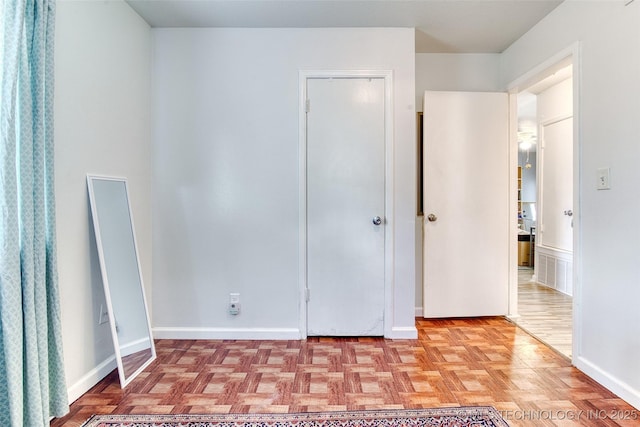 12750 E 23rd St, Tulsa, OK 74129 - unfurnished bedroom featuring baseboards