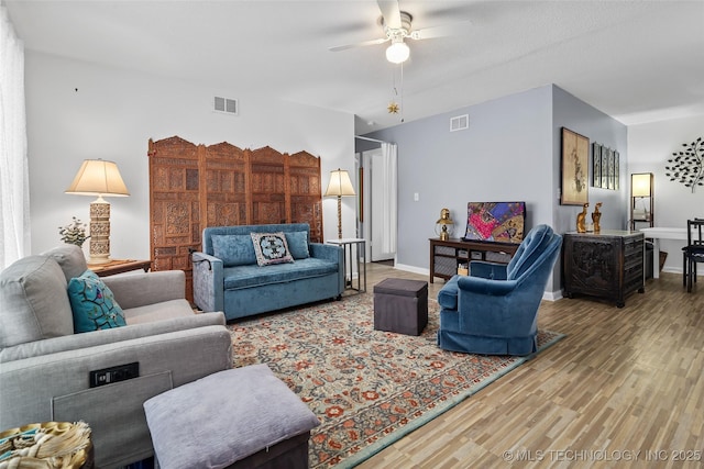 12750 E 23rd St, Tulsa, OK 74129 - living area featuring wood finished floors and a ceiling fan