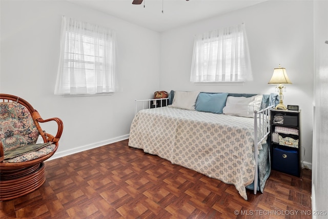 12750 E 23rd St, Tulsa, OK 74129 - bedroom with baseboards and ceiling fan