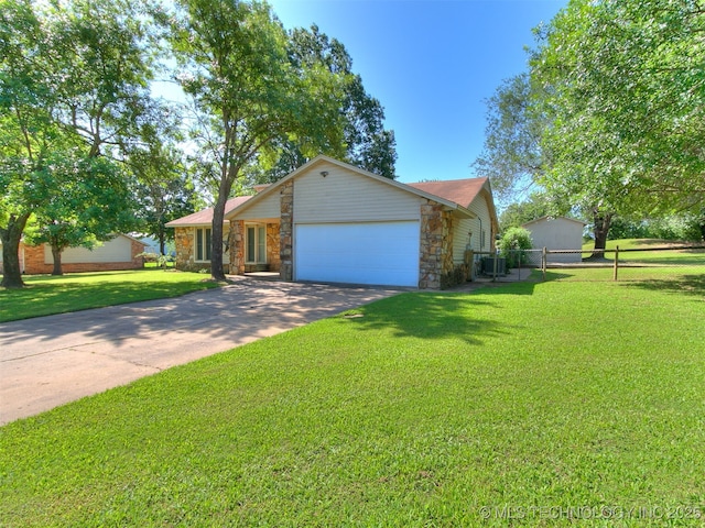25136 Hickory Ln, Broken Arrow, OK 74014 - view of front of property with concrete driveway, an attached garage, and stone siding