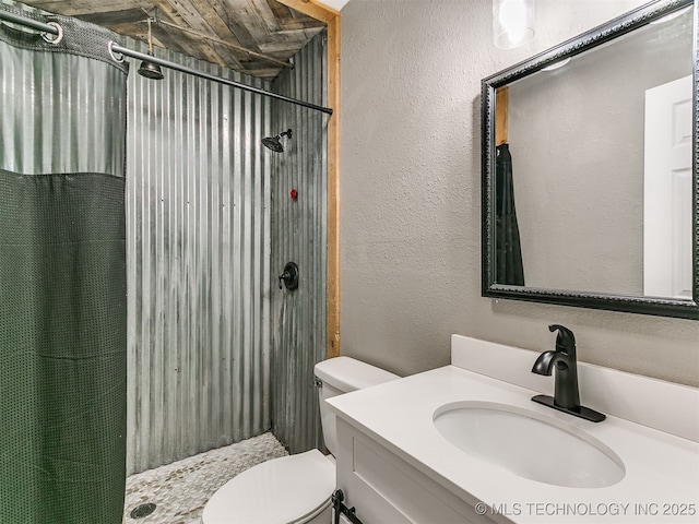 25136 Hickory Ln, Broken Arrow, OK 74014 - bathroom with a shower with shower curtain, vanity, and a textured wall