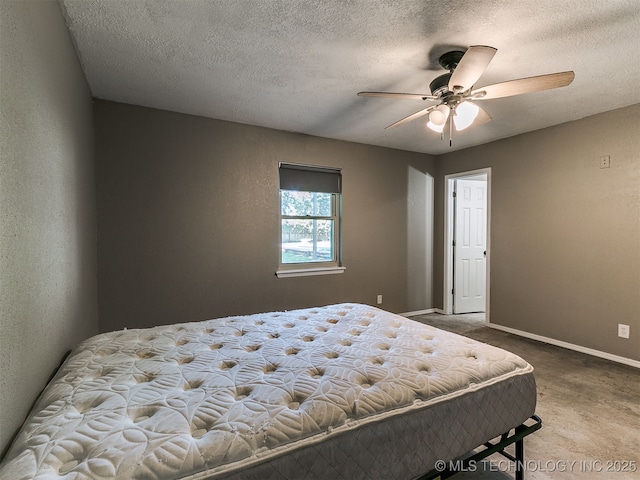 25136 Hickory Ln, Broken Arrow, OK 74014 - carpeted bedroom featuring a textured ceiling and a ceiling fan