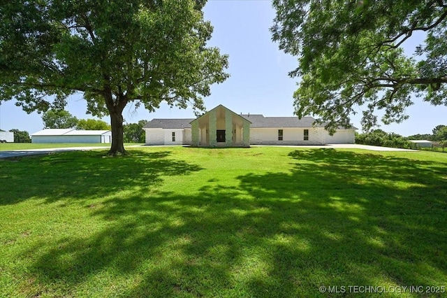 13973 S 237th E Ave, Coweta, OK 74429 - view of front of property with a front lawn and stucco siding