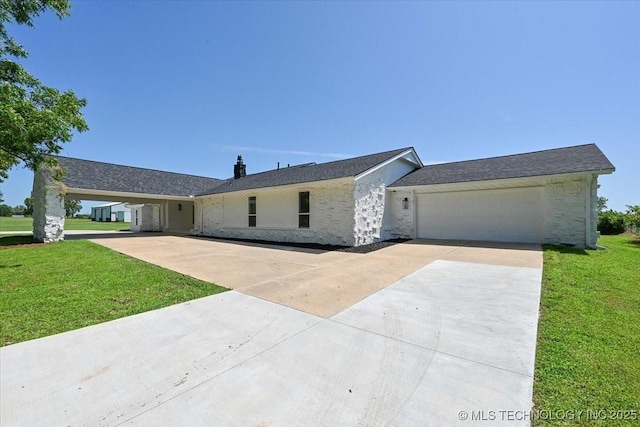 13973 S 237th E Ave, Coweta, OK 74429 - ranch-style home featuring driveway, a front yard, and an attached garage