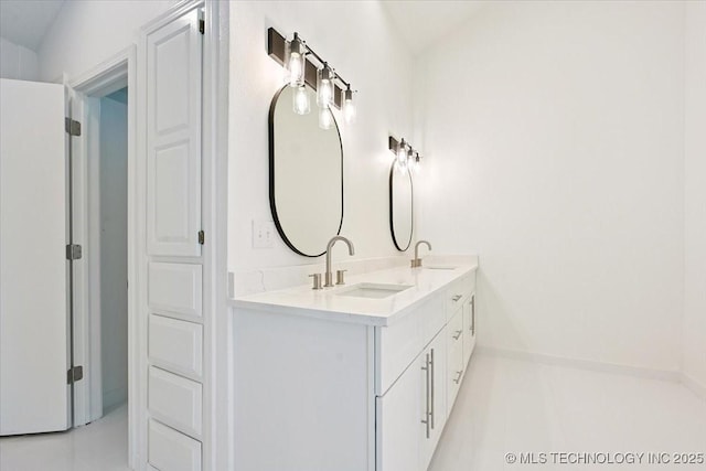 13973 S 237th E Ave, Coweta, OK 74429 - bathroom featuring double vanity and tile patterned floors