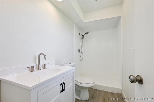 13973 S 237th E Ave, Coweta, OK 74429 - bathroom with a shower stall, wood finished floors, and vanity
