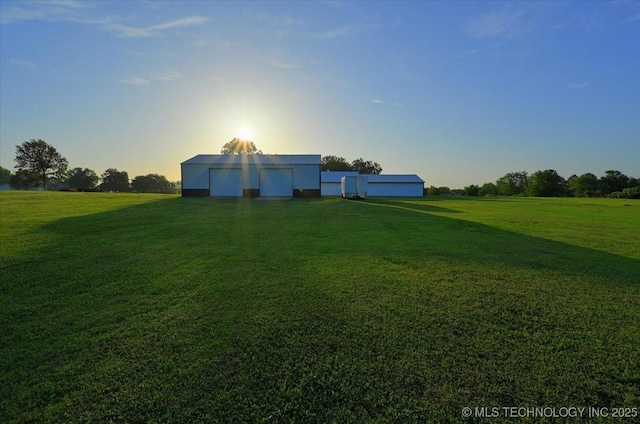 13973 S 237th E Ave, Coweta, OK 74429 - view of green lawn with a garage