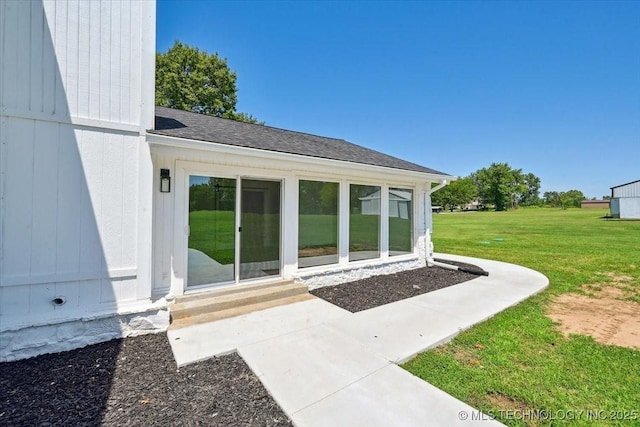 13973 S 237th E Ave, Coweta, OK 74429 - view of exterior entry featuring a yard and roof with shingles