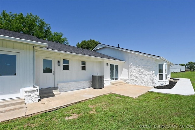 13973 S 237th E Ave, Coweta, OK 74429 - back of property with entry steps, a yard, stone siding, and a patio
