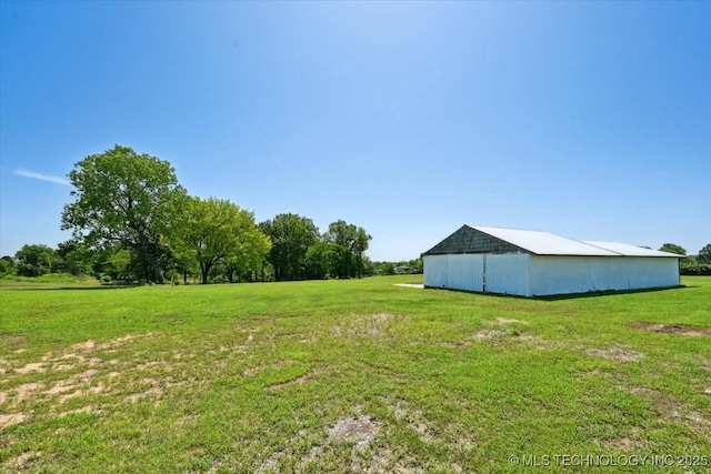 13973 S 237th E Ave, Coweta, OK 74429 - view of grassy yard featuring a pole building and an outbuilding