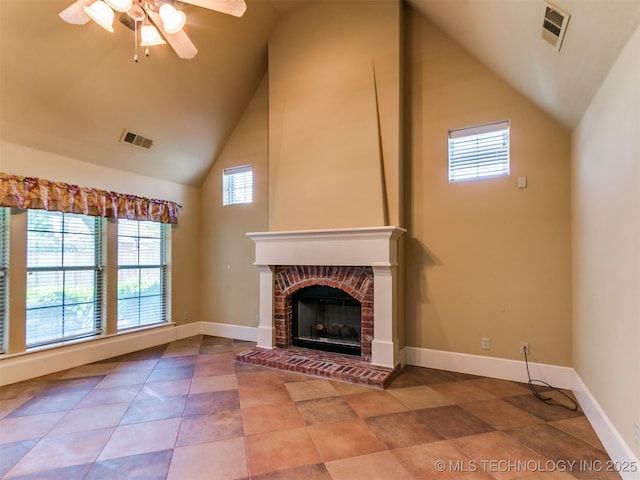 9314 S 76th E Ave, Tulsa, OK 74133 - unfurnished living room with a ceiling fan, plenty of natural light, a brick fireplace, and high vaulted ceiling