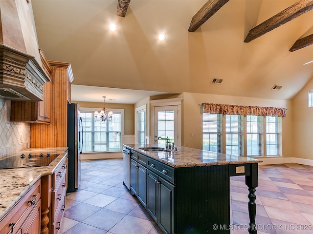9314 S 76th E Ave, Tulsa, OK 74133 - kitchen with premium range hood, black appliances, tasteful backsplash, a chandelier, and a center island with sink