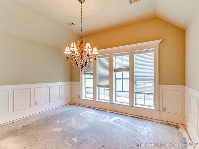 9314 S 76th E Ave, Tulsa, OK 74133 - unfurnished room with a wainscoted wall, vaulted ceiling, a decorative wall, and a chandelier