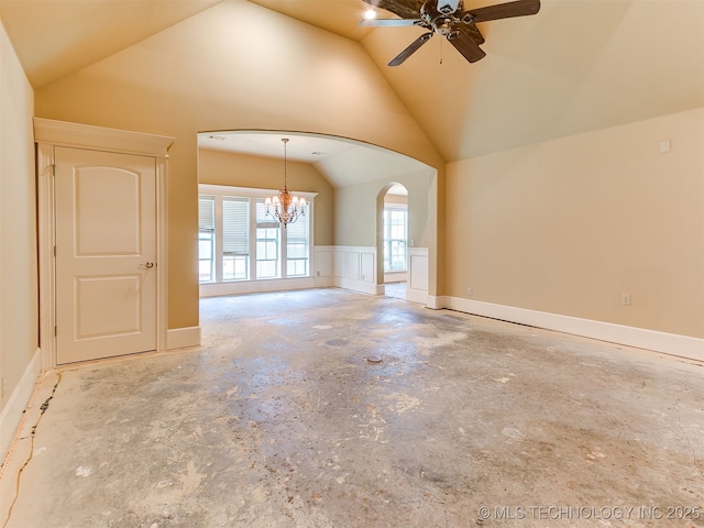 9314 S 76th E Ave, Tulsa, OK 74133 - unfurnished room with lofted ceiling, a chandelier, a ceiling fan, arched walkways, and a wainscoted wall