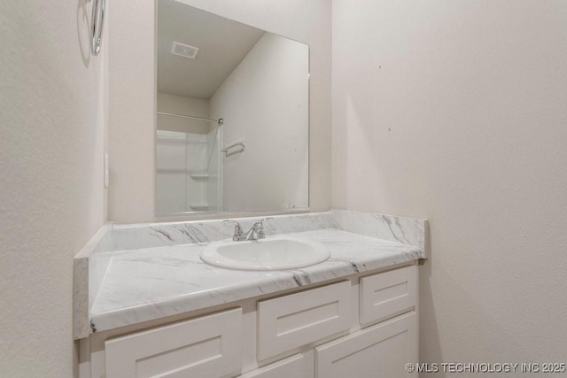 14203 N 76th Ave, Collinsville, OK 74021 - bathroom featuring vanity and a shower