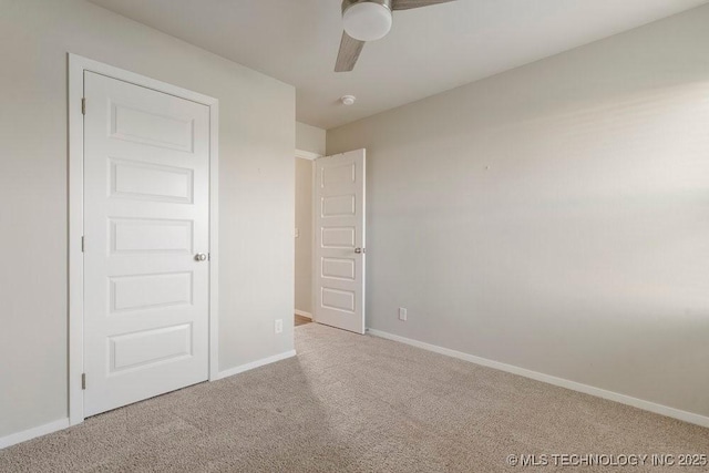 14203 N 76th Ave, Collinsville, OK 74021 - unfurnished bedroom featuring carpet and a ceiling fan