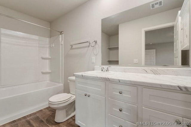 14203 N 76th Ave, Collinsville, OK 74021 - bathroom featuring vanity, wood finished floors, and shower / tub combination