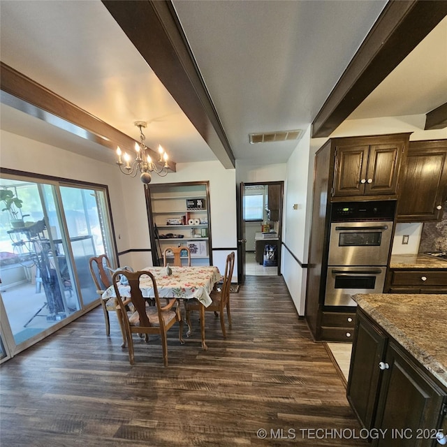 1533 Terrill Cir, Sapulpa, OK 74066 - dining room featuring a chandelier, dark wood-style flooring, and beam ceiling
