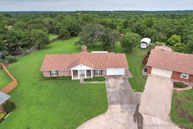 1533 Terrill Cir, Sapulpa, OK 74066 - aerial view of property and surrounding area featuring a heavily wooded area