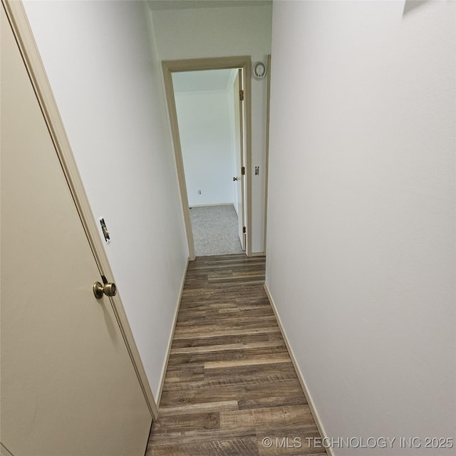 1533 Terrill Cir, Sapulpa, OK 74066 - hall featuring dark wood-style flooring and baseboards