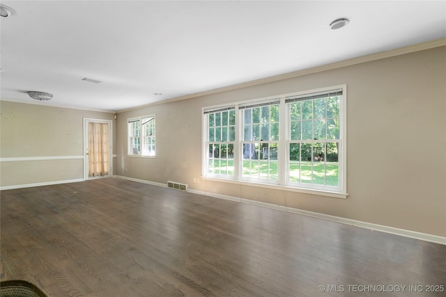 4135 S Zunis Ave, Tulsa, OK 74105 - spare room with ornamental molding and wood finished floors