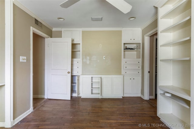 4135 S Zunis Ave, Tulsa, OK 74105 - unfurnished bedroom featuring dark wood-style flooring and ornamental molding