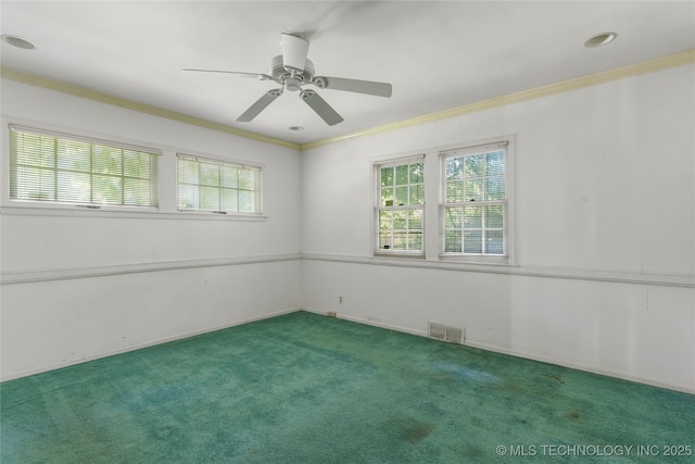 4135 S Zunis Ave, Tulsa, OK 74105 - carpeted spare room with crown molding and a ceiling fan