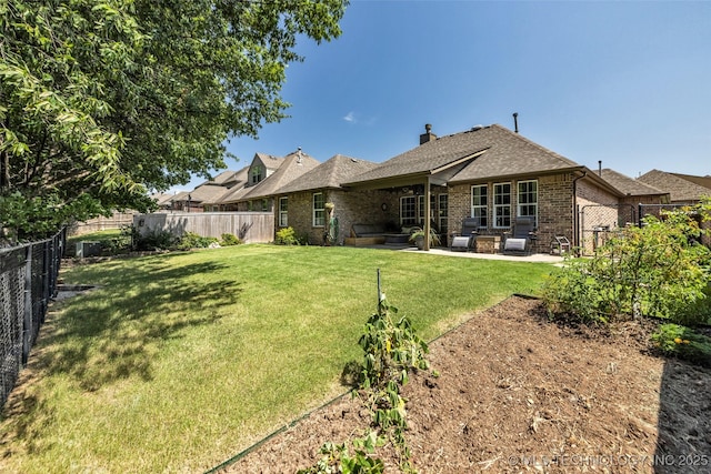 1116 W Fargo Dr, Broken Arrow, OK 74012 - rear view of house with brick siding, a patio area, a fenced backyard, a chimney, and a shingled roof