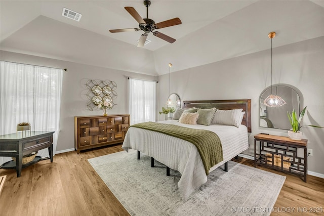 1116 W Fargo Dr, Broken Arrow, OK 74012 - bedroom featuring light wood-style floors, lofted ceiling, and a ceiling fan
