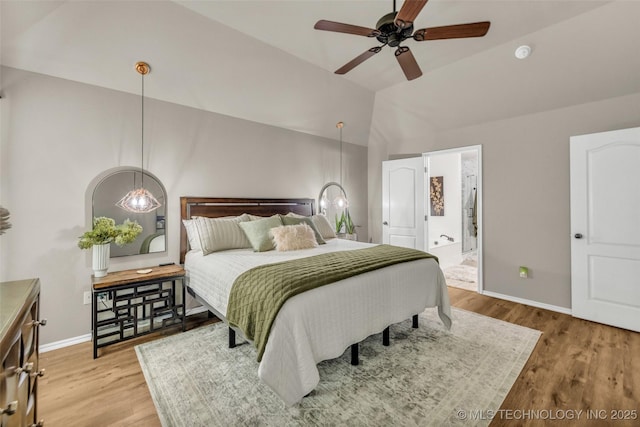 1116 W Fargo Dr, Broken Arrow, OK 74012 - bedroom featuring wood finished floors, lofted ceiling, connected bathroom, and a ceiling fan