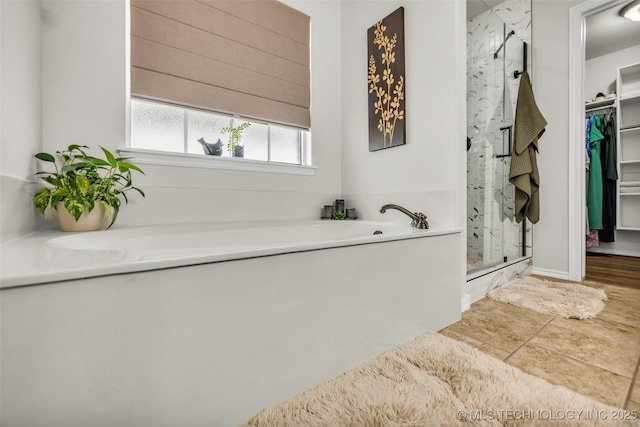 1116 W Fargo Dr, Broken Arrow, OK 74012 - full bathroom with a stall shower, a bath, and a walk in closet