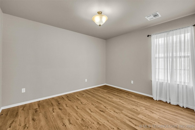 1116 W Fargo Dr, Broken Arrow, OK 74012 - spare room with wood finished floors