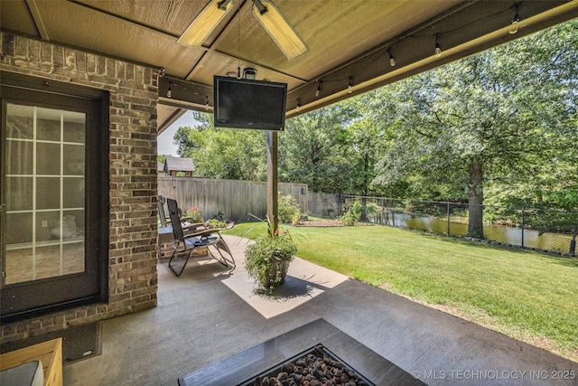 1116 W Fargo Dr, Broken Arrow, OK 74012 - fenced backyard with a patio area and a ceiling fan