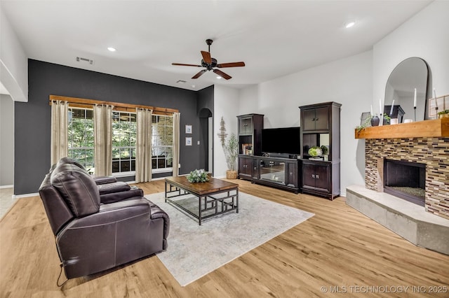 1116 W Fargo Dr, Broken Arrow, OK 74012 - living area featuring a ceiling fan, a fireplace, light wood-style flooring, and recessed lighting