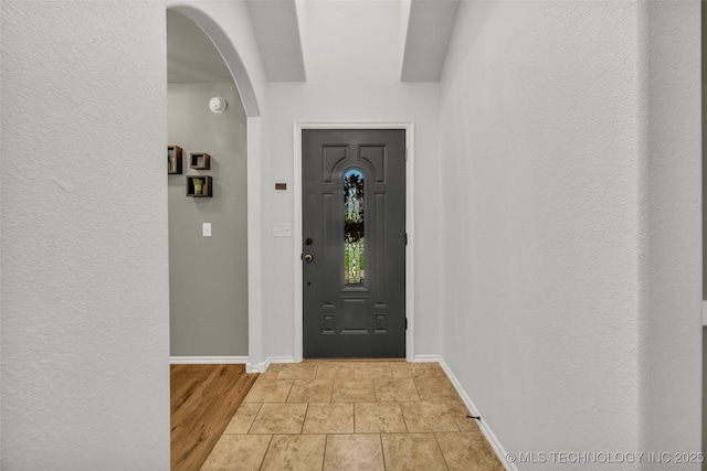 1116 W Fargo Dr, Broken Arrow, OK 74012 - entryway with arched walkways and baseboards
