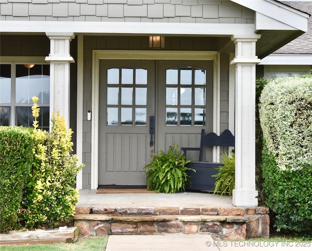 71279 S 270th Rd, Wagoner, OK 74467 - doorway to property featuring covered porch