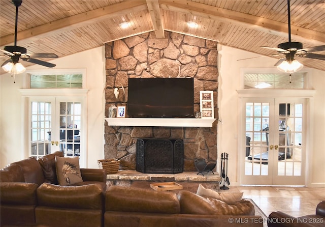 71279 S 270th Rd, Wagoner, OK 74467 - living area featuring french doors, ceiling fan, wooden ceiling, plenty of natural light, and a fireplace