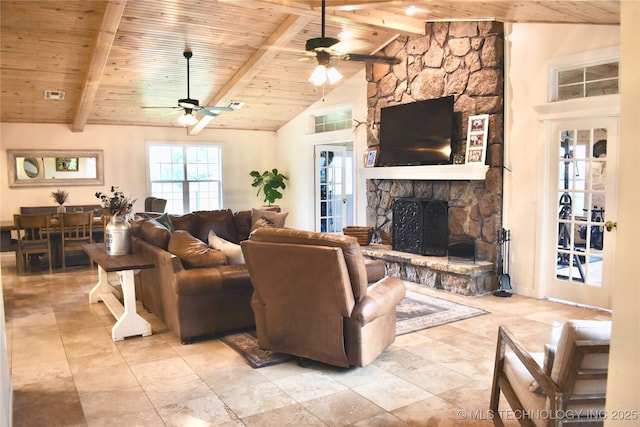 71279 S 270th Rd, Wagoner, OK 74467 - living room with a wood ceiling with exposed beams, a ceiling fan, a fireplace, and high vaulted ceiling