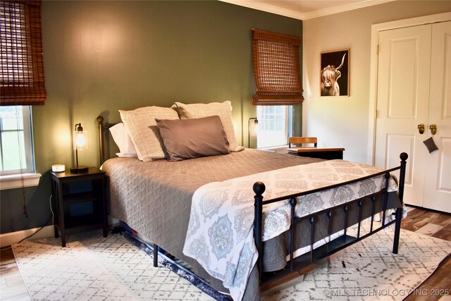 71279 S 270th Rd, Wagoner, OK 74467 - bedroom with ornamental molding and wood finished floors