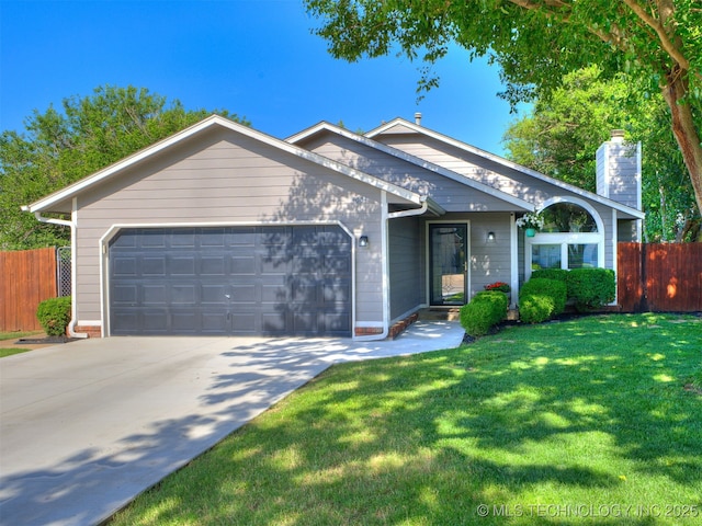 4004 S Sycamore Ave, Broken Arrow, OK 74011 - view of front of home featuring an attached garage, a chimney, and concrete driveway